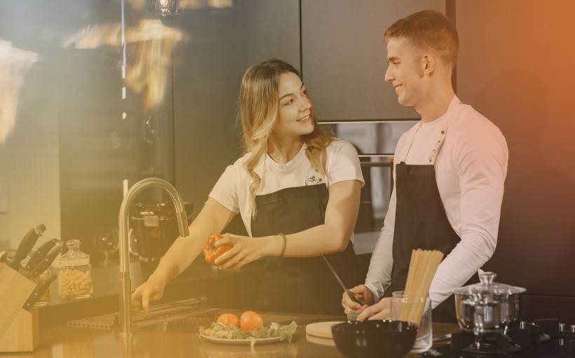 Cook a romantic dinner together when it rains